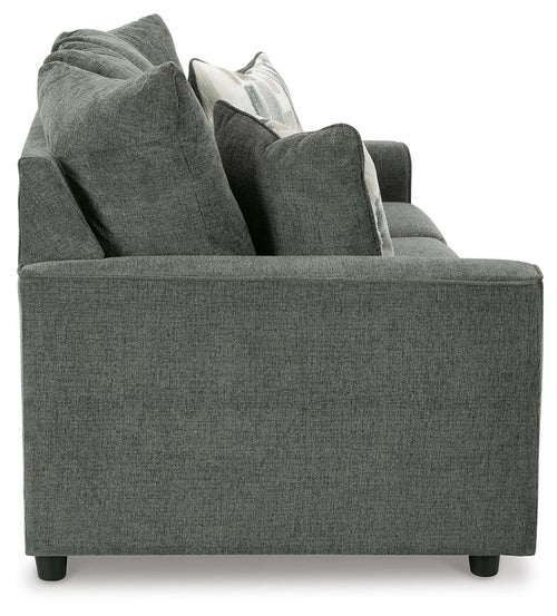 Stairatt sofa corner view with wide armrests, tufted back, and gray fabric upholstery