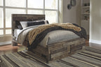 Dark wood panel bed frame with tan faux-fur throw and dark bedding accents