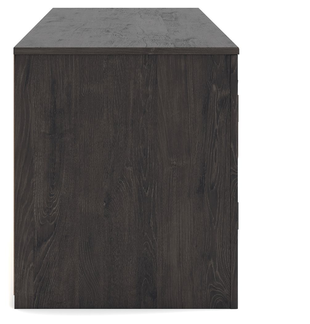 Dark wood TV stand with fireplace opening and flat top surface