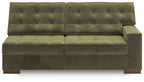 Olive green RAF sofa with channel-tufted back panels and split padded base