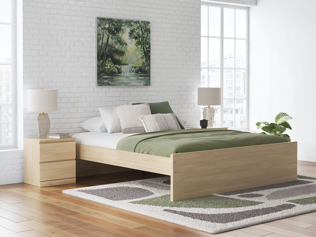 Light brown platform bed with slatted base and low side rails, front storage not visible