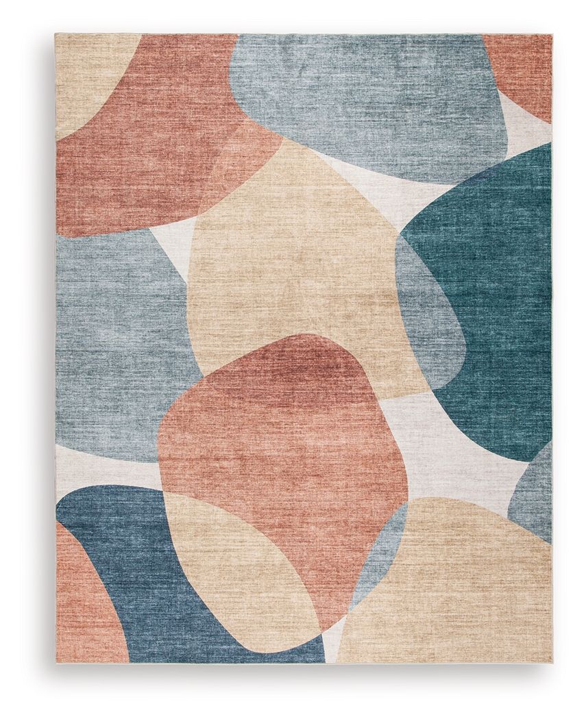Washable geometric rug with blue, coral, beige, and gray abstract shapes