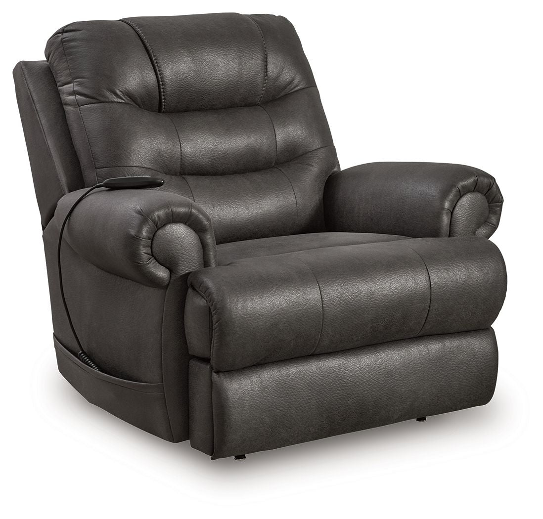 Dark gray leather-look power lift recliner with padded headrest and rounded arms