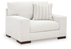 Frosted chair and a half, light fabric upholstery, striped pillow, dark wooden legs
