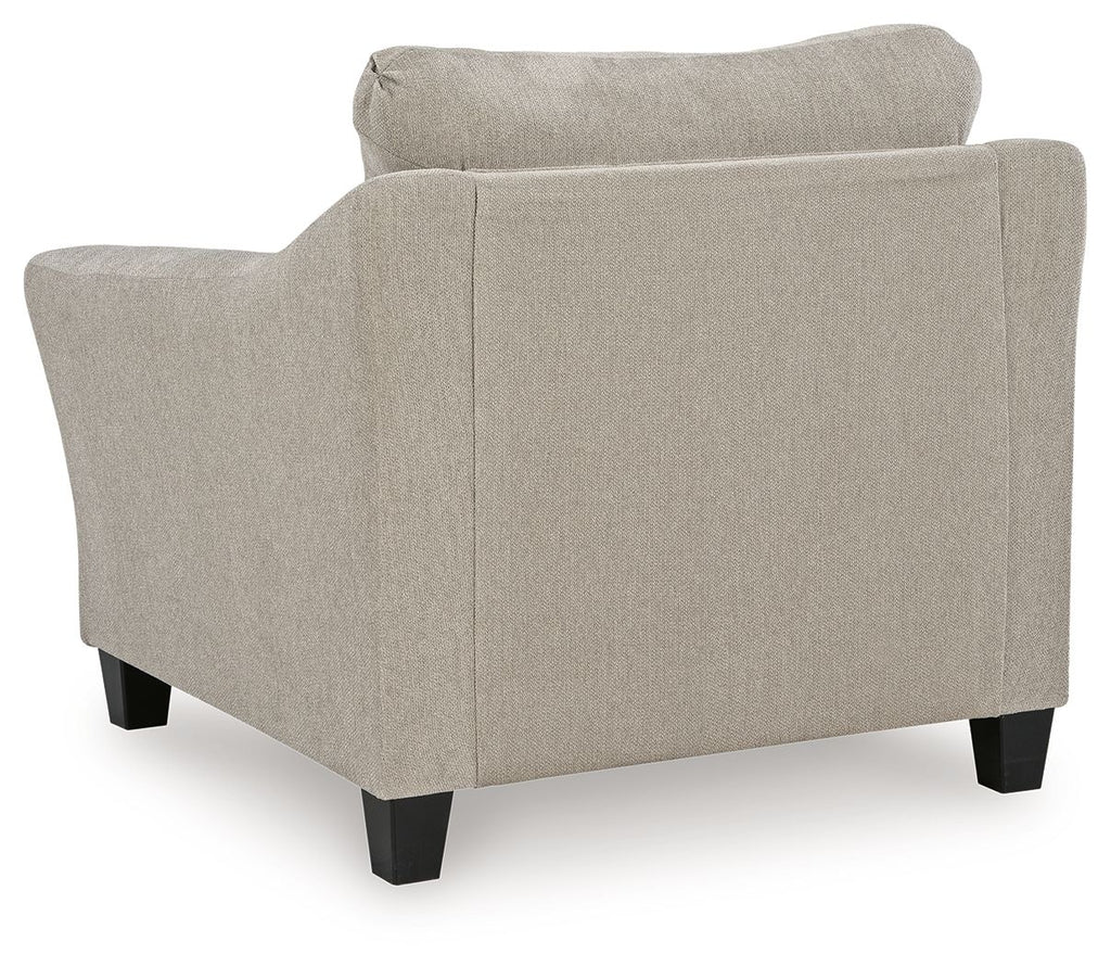 Taupe upholstered chair back and seat with wide arms and dark square legs