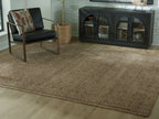 Geometric area rug with dark brown base, light beige pattern and fringeless edge