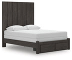 Dark gray panel storage bed with tall headboard, white mattress, and two pillows