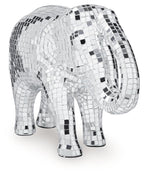 Silver mosaic elephant sculpture side view with raised trunk and small black tile accents