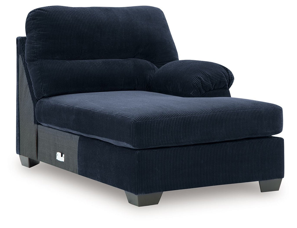 Navy ribbed corner chaise with rounded arms and cushioned seat