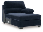 Navy ribbed corner chaise with rounded arms and cushioned seat