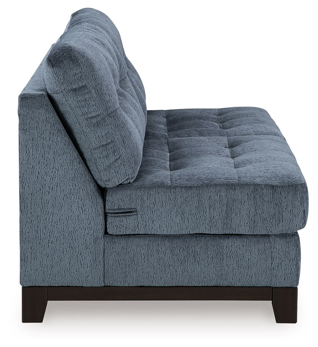 Dark navy armless loveseat with rolled back, tufted seat, and wooden feet