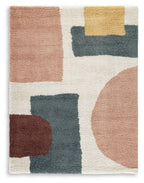 Geometric area rug with pink, tan, teal, and white blocks