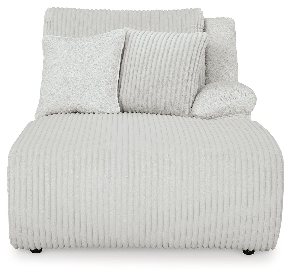 Press-back power chaise with ribbed light gray upholstery, two back pillows, and rounded armrest