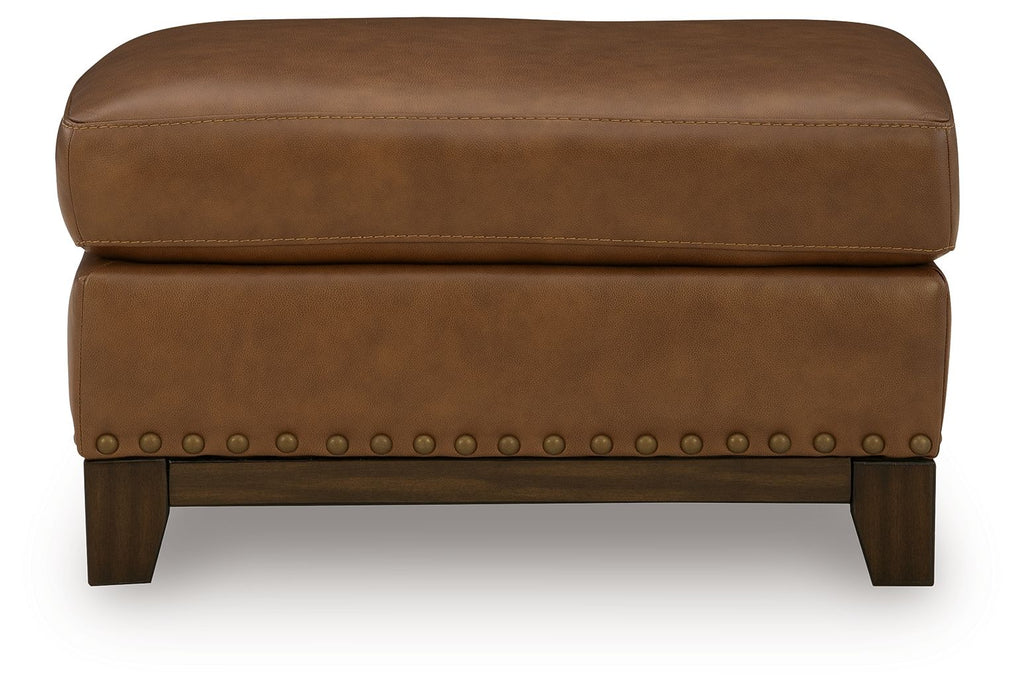 Saonara amber ottoman, padded cushion top, studded side trim, dark wooden legs