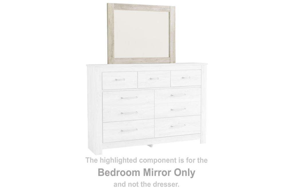 Whitewashed wood frame bedroom mirror with straight rectangular outline