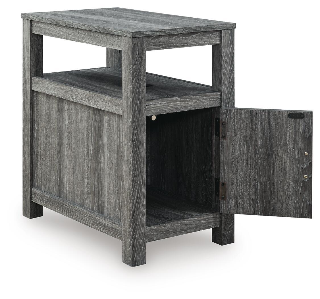 Chair side end table in weathered gray wood with open shelf and open cabinet door
