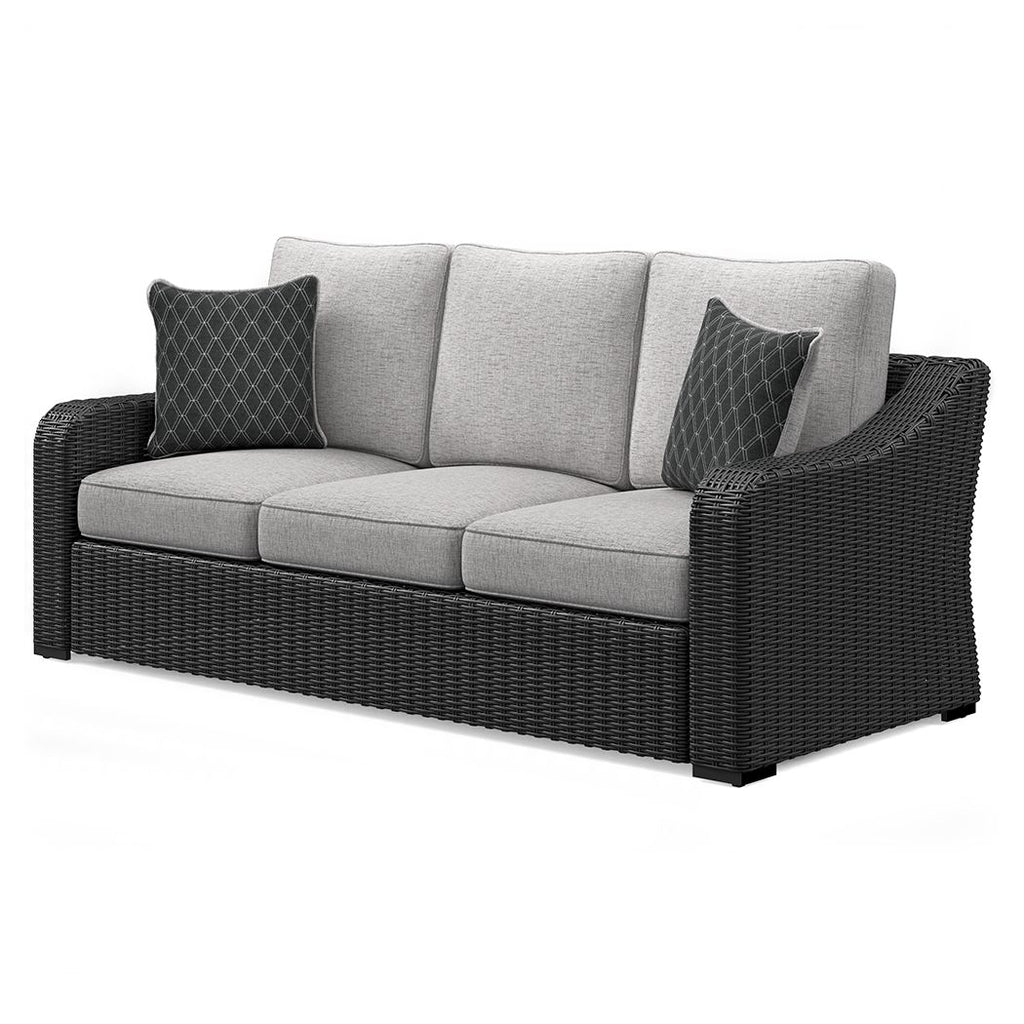 Beachcroft sofa with cushions, dark wicker arms and base, light gray seats with square pillows