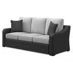 Beachcroft sofa with cushions, dark wicker arms and base, light gray seats with square pillows