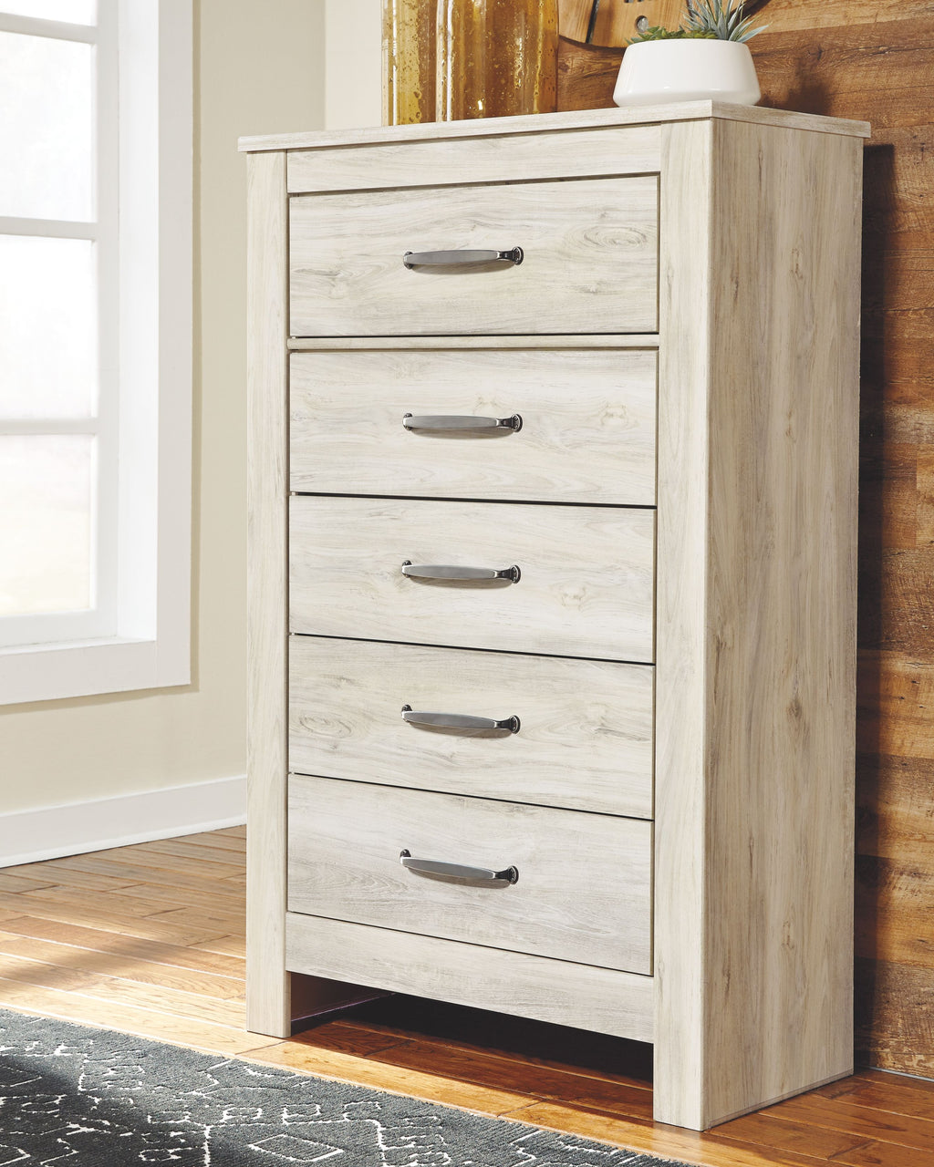 Whitewash five-drawer chest with five drawers and metal bar handles