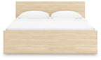 Light brown wood panel platform bed with low front panel and white mattress