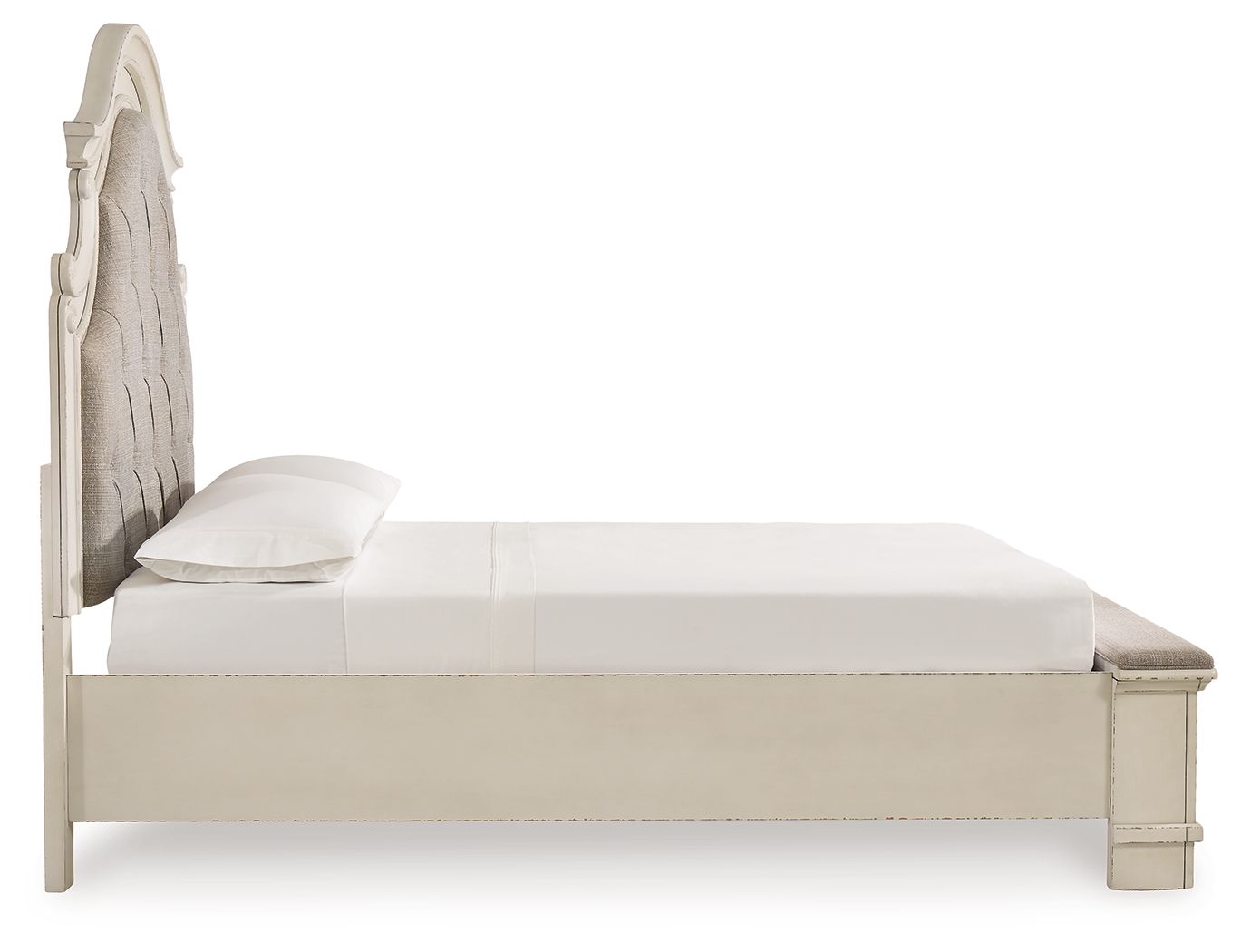Storage bed side view with upholstered headboard and smooth white platform