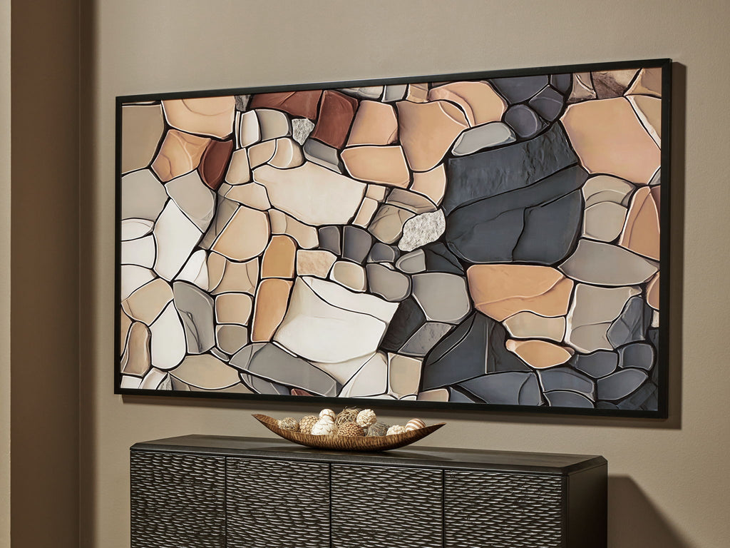 Framed abstract stone wall art print with black, tan, and white block shapes
