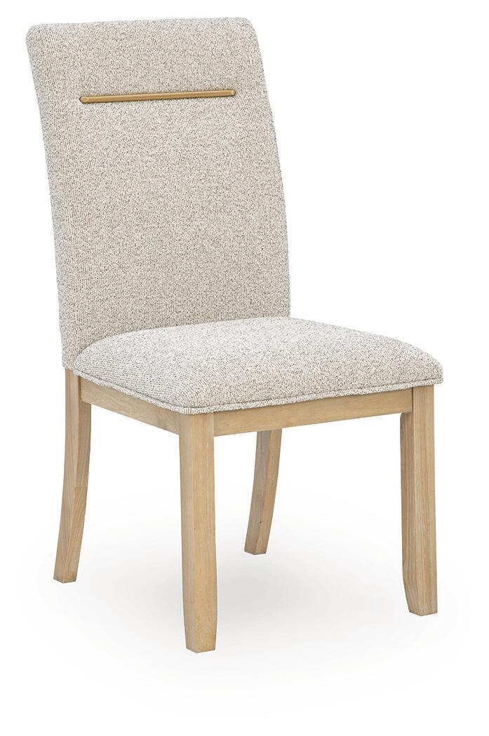 Light beige upholstered dining side chair with wooden legs and gold back bar