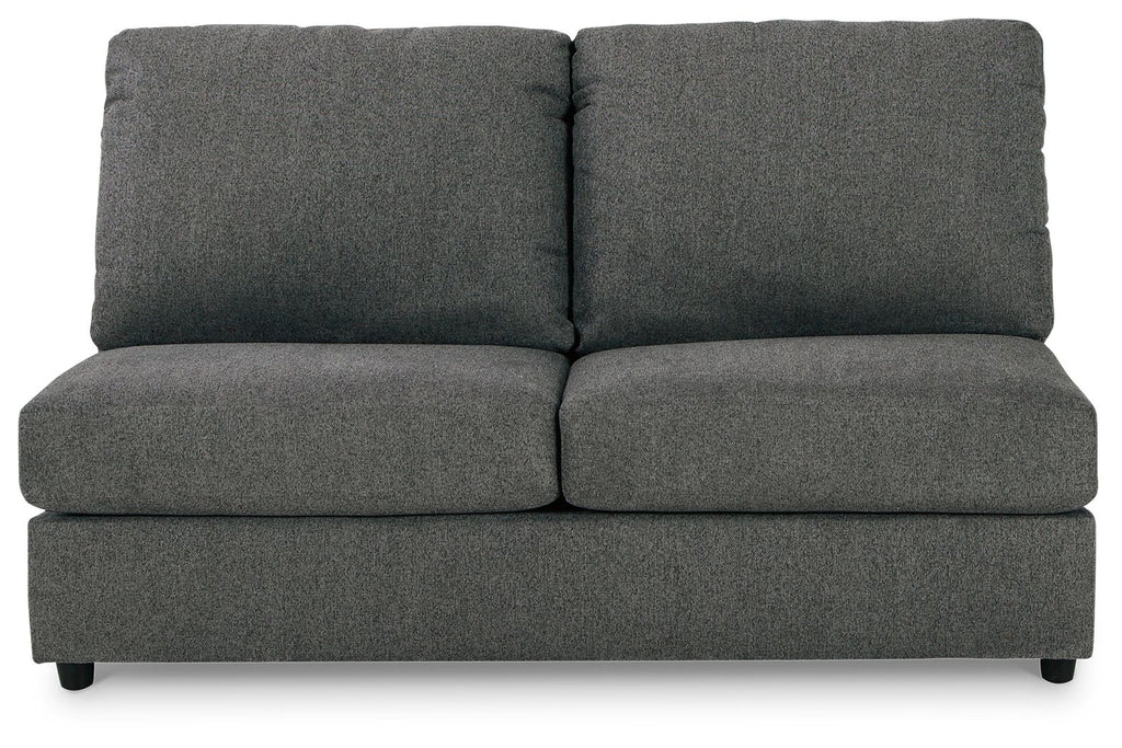 Dark gray armless loveseat with two back cushions and low-profile seat, square arms