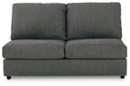Dark gray armless loveseat with two back cushions and low-profile seat, square arms