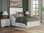 White panel storage bed with built-in drawers at the footboard
