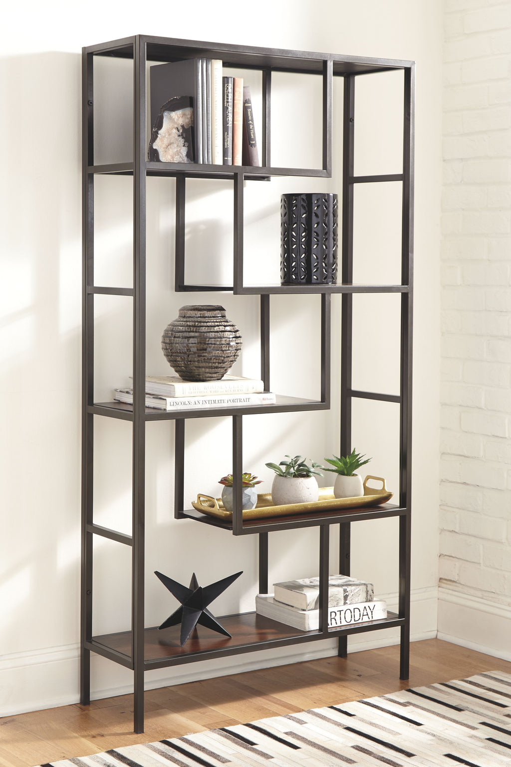 Dark brown bookcase with open cubbies and multiple square shelves