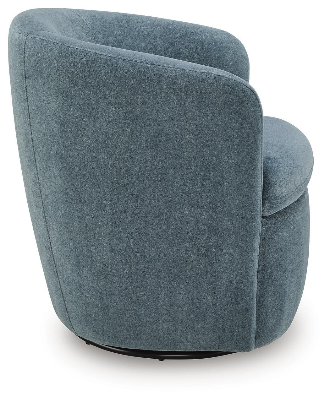 Swivel accent chair in blue-gray velvet with rounded arms and curved backrest.