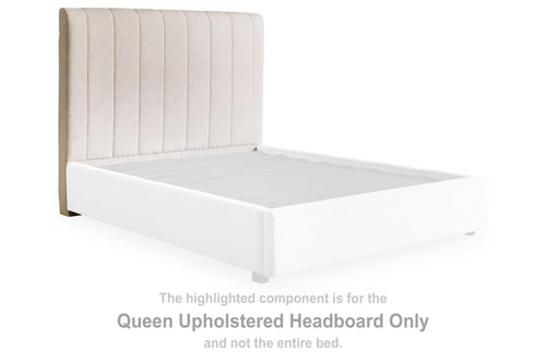 Beige upholstered queen headboard with vertical channel stitching, padded sides