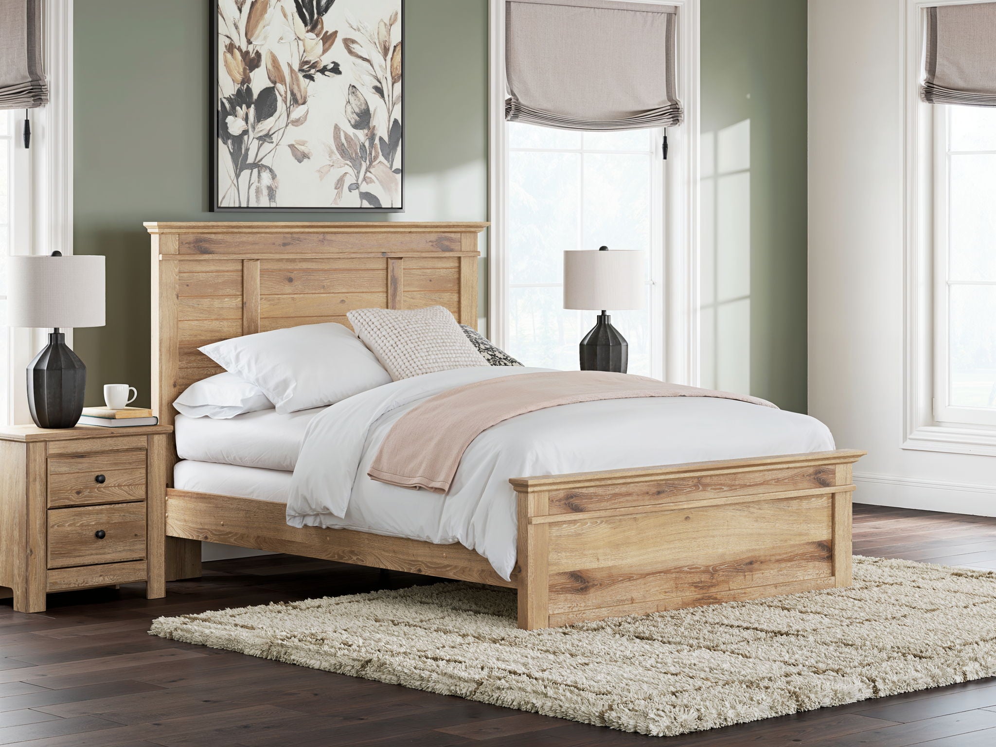Light brown panel bed with slatted rails and white bedding in a bedroom setup