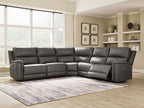 Power reclining sectional sofa, dark gray with padded arms, recline chaise, and corner section