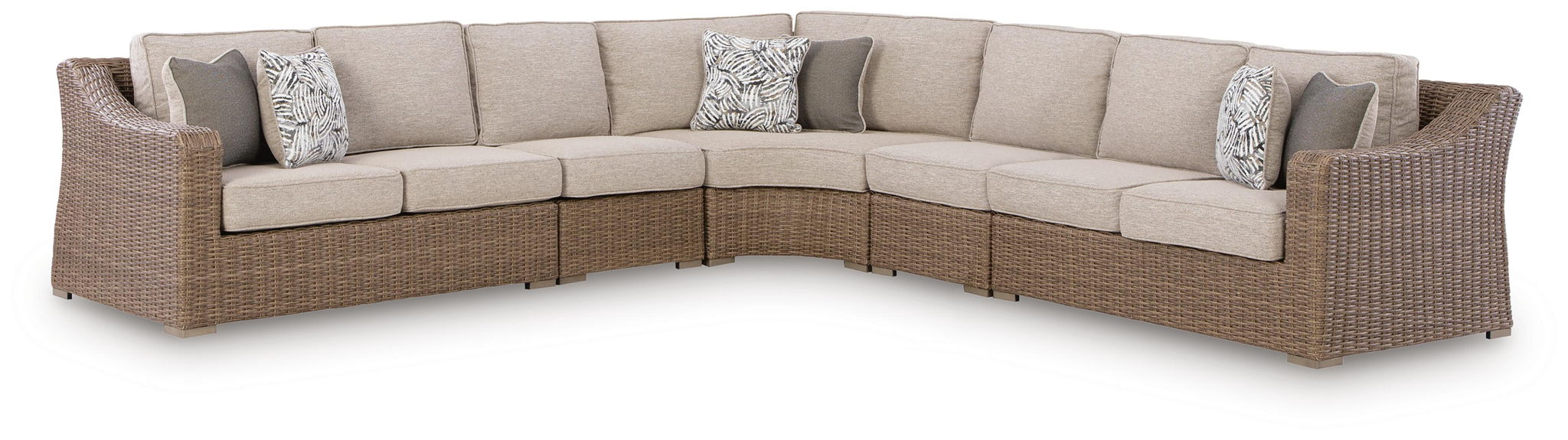 Beige outdoor sectional sofa with corner cushions and woven base, throw pillows