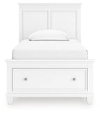 White panel bed with one front drawer and a padded upholstered headboard with pillow