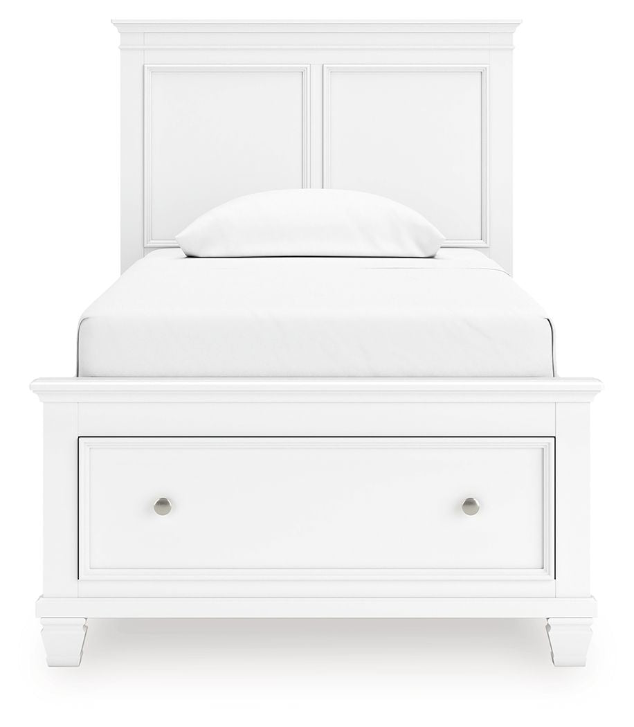 White panel bed with one front drawer and a padded upholstered headboard with pillow