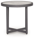 Gray round side table with white marble-look top and four corner feet