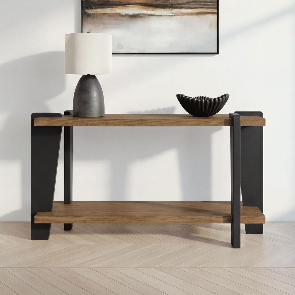 Rectangular table with wood top and lower shelf, black legs and corner pads