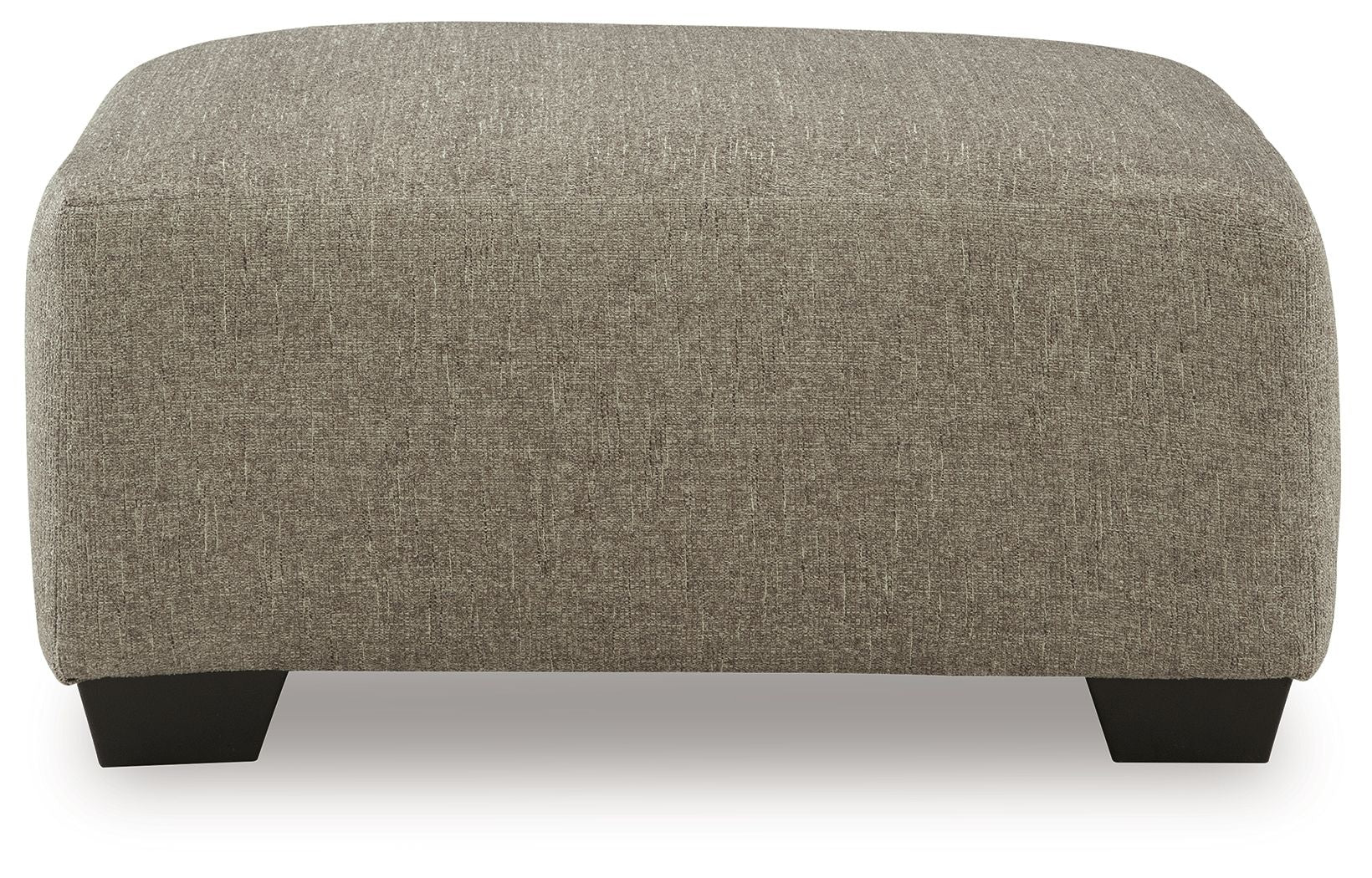 Beige oversized accent ottoman with rounded corners and dark feet
