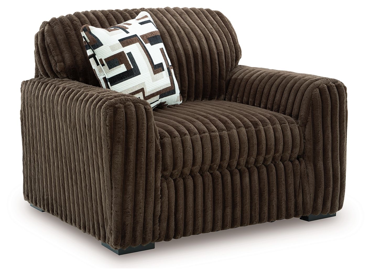Dark brown chair-and-a-half with ribbed fabric and patterned throw pillow
