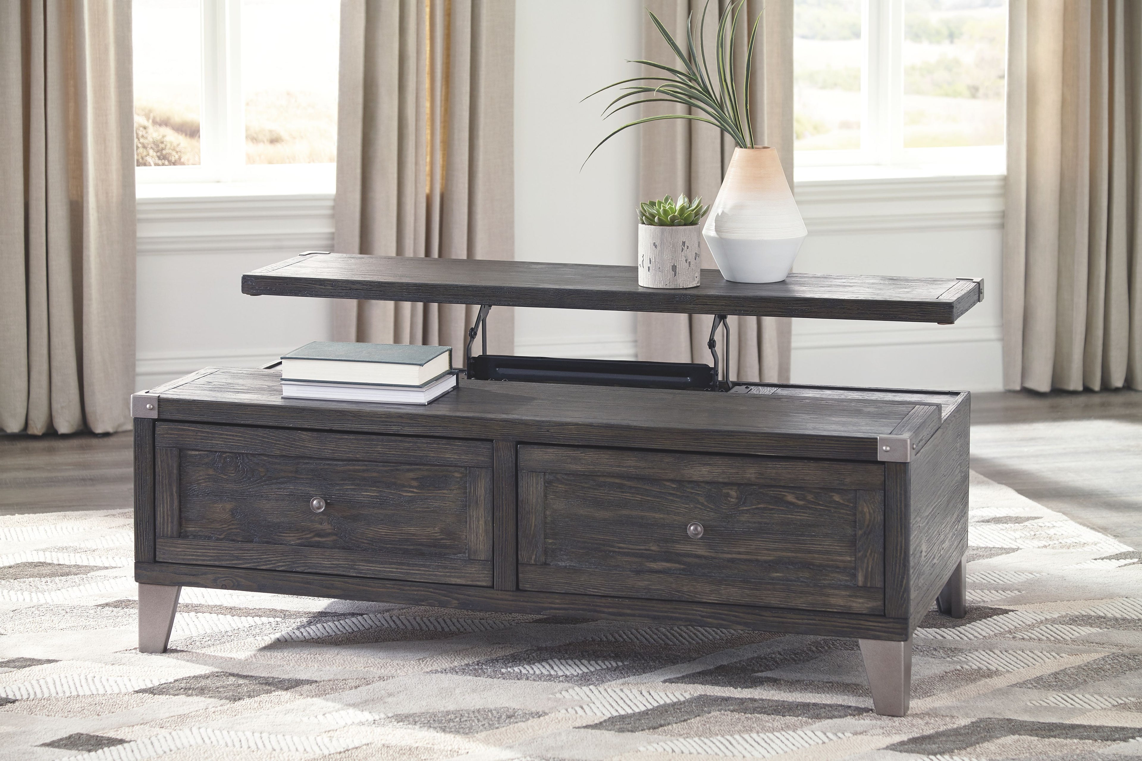 Lift-top cocktail table, dark gray wood, two drawers with round knobs