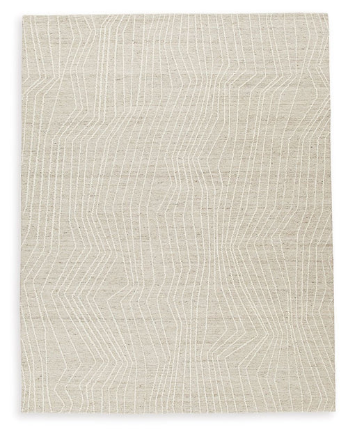 Cream area rug with repeating geometric line pattern in textured weave