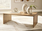 Light brown rectangular table with open shelf, styled with decor and books