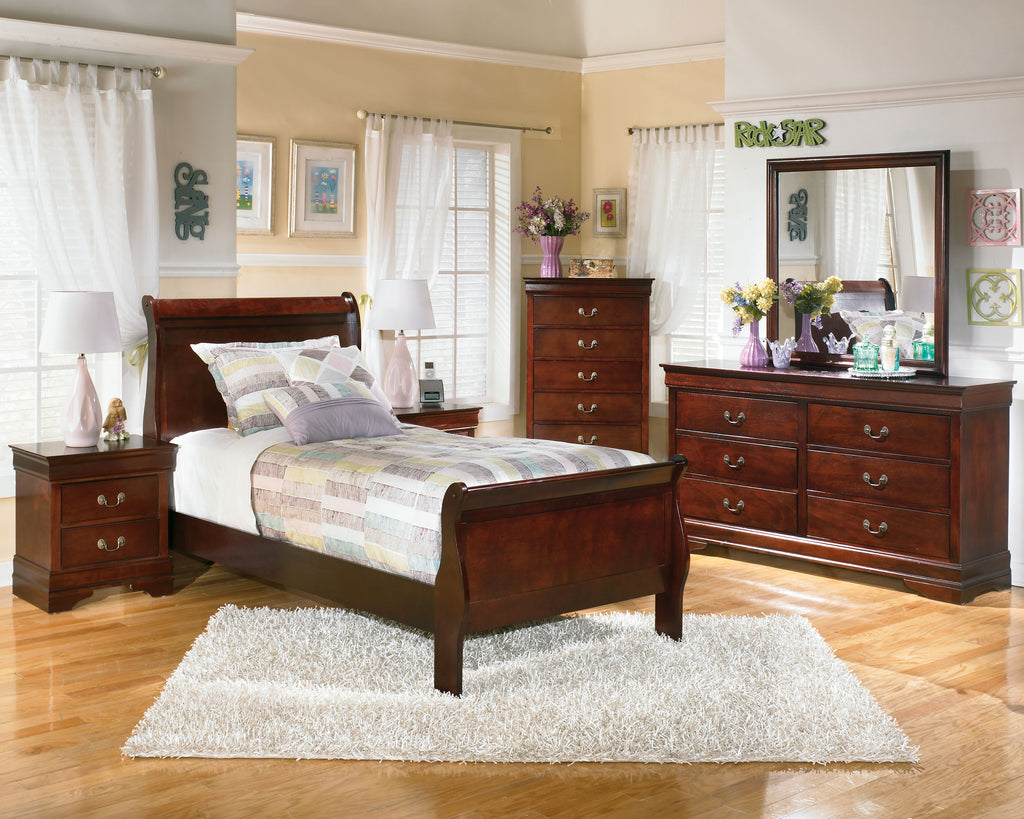 Reddish brown wooden dresser chest with multiple drawers and curved metal pulls