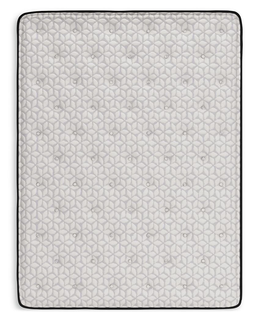 Rectangular mattress in white with dark border and quilted top surface