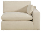 Light beige linen corner chair with rounded back and seat cushions