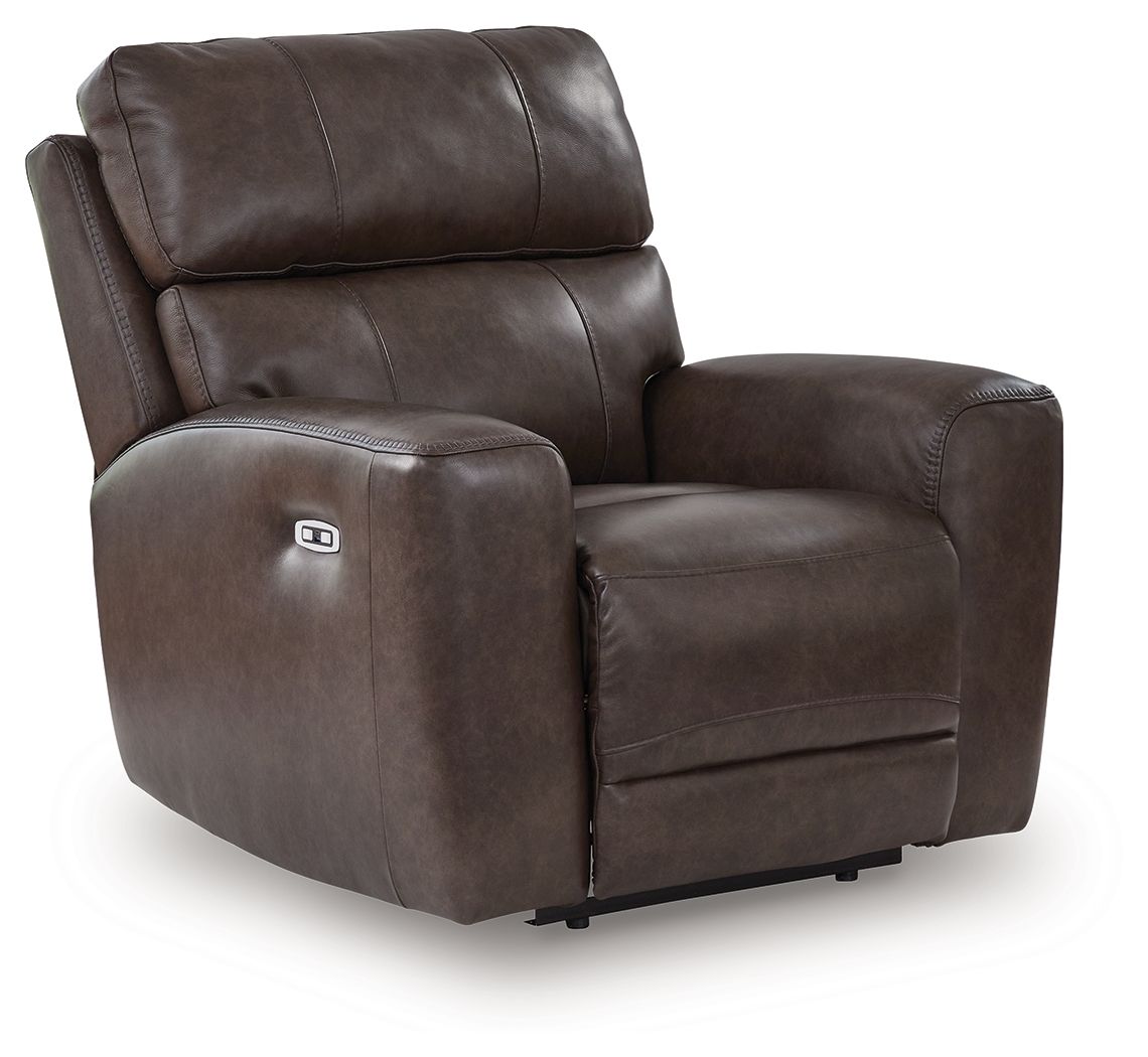 Dark smoke-brown power recliner with padded headrest, wide arms, and side control panel