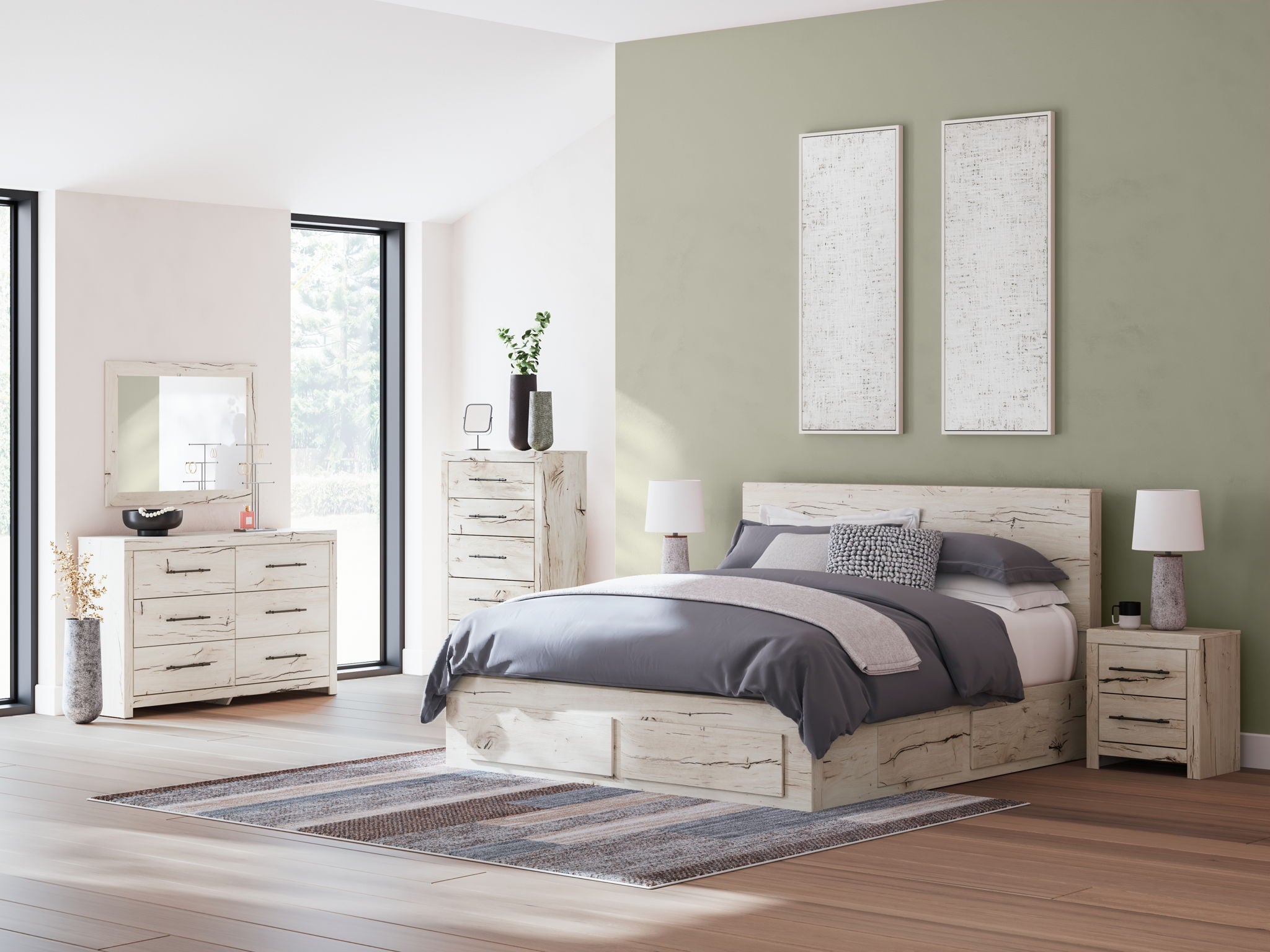 Bedroom storage set with bed and matching dresser, light wood finish, wall art and lamps